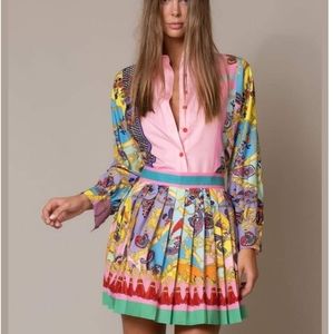 Size Medium skirt and shirt, but fits like Small.